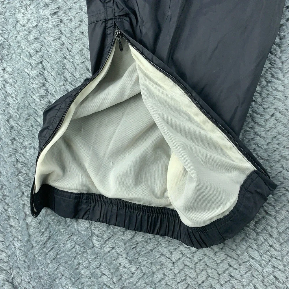 Nike Kids L 12-14 Black Nylon Windbreaker Track Pants Lined Zipper Cuffs Joggers
